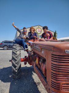Student leaders on a tractor